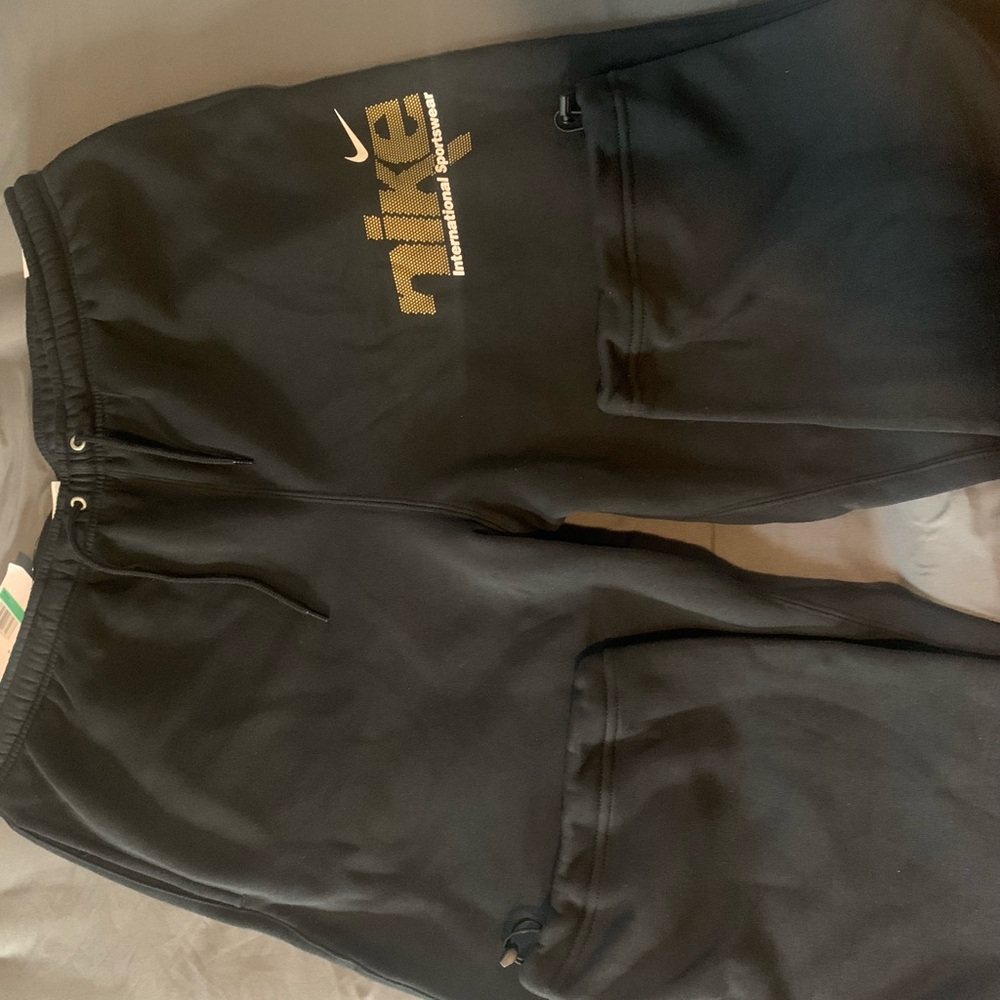 Nike Black Joggers with Gold Logo